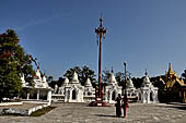 Myanmar - Mandalay, Kuthodaw Pagoda. 729 white pitaka pagodas contain the Tipitaka, the sacred texts of Theravada Buddhism. 